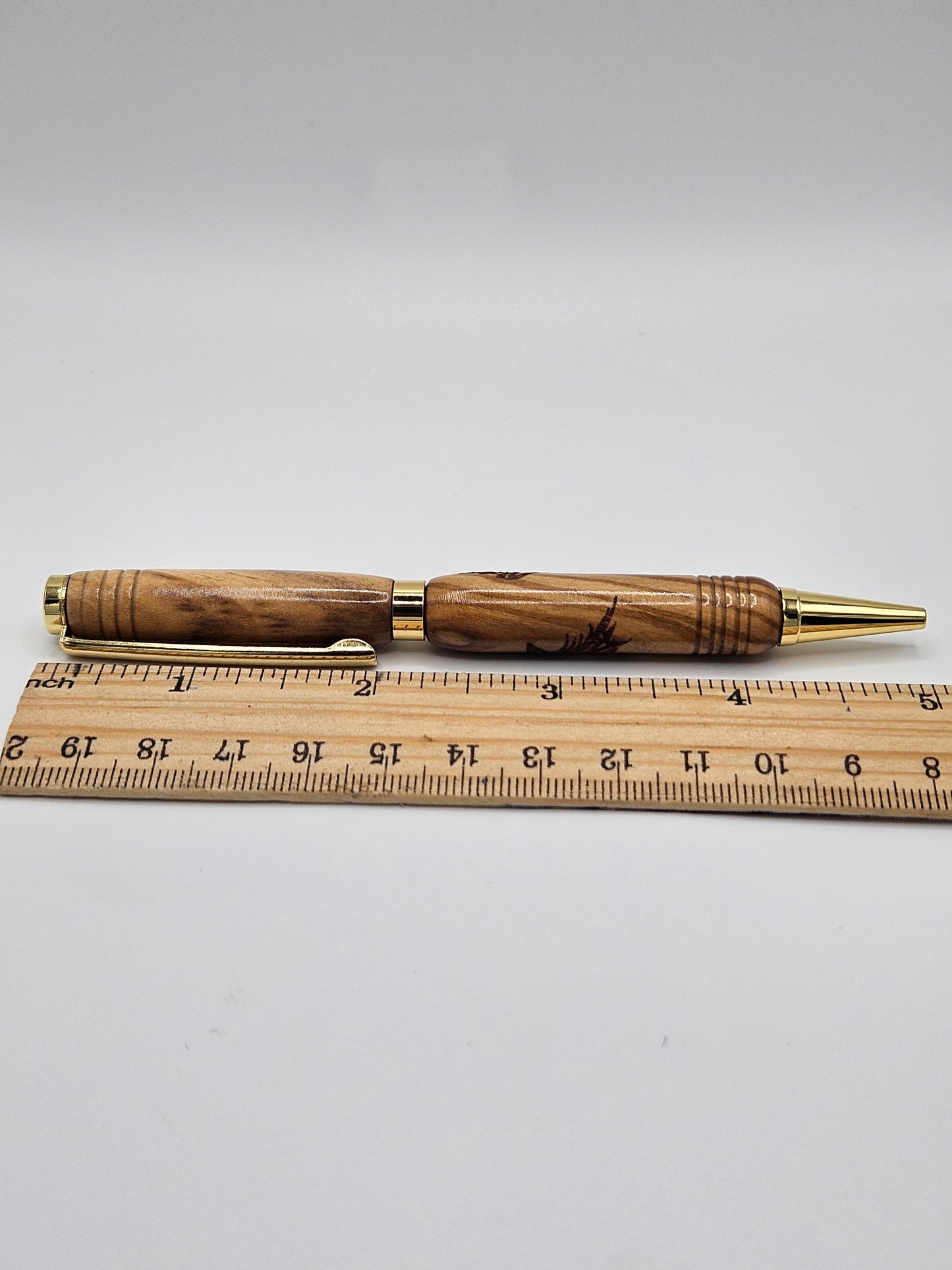 Olive Wood Slimline pen with wolf engraving